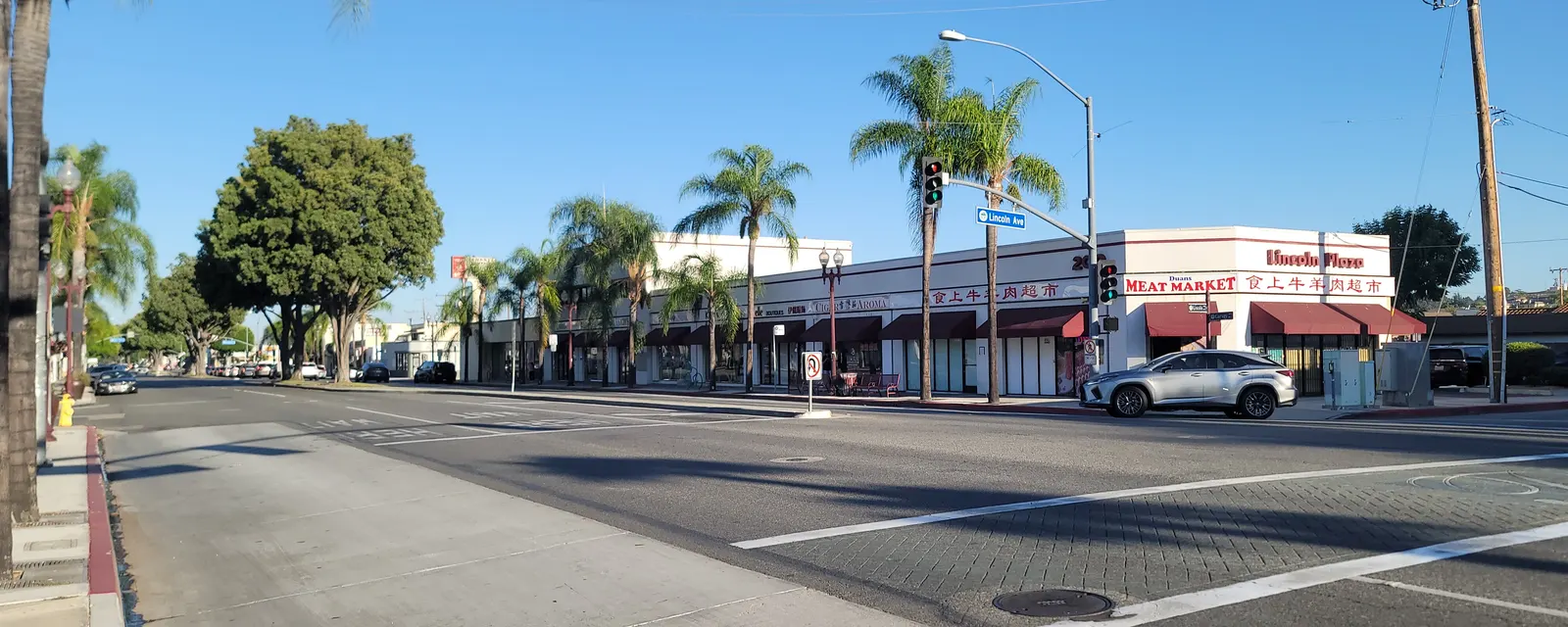 A corner of shops at Garvey and Lincoln in Monterey Park in the late afternoon