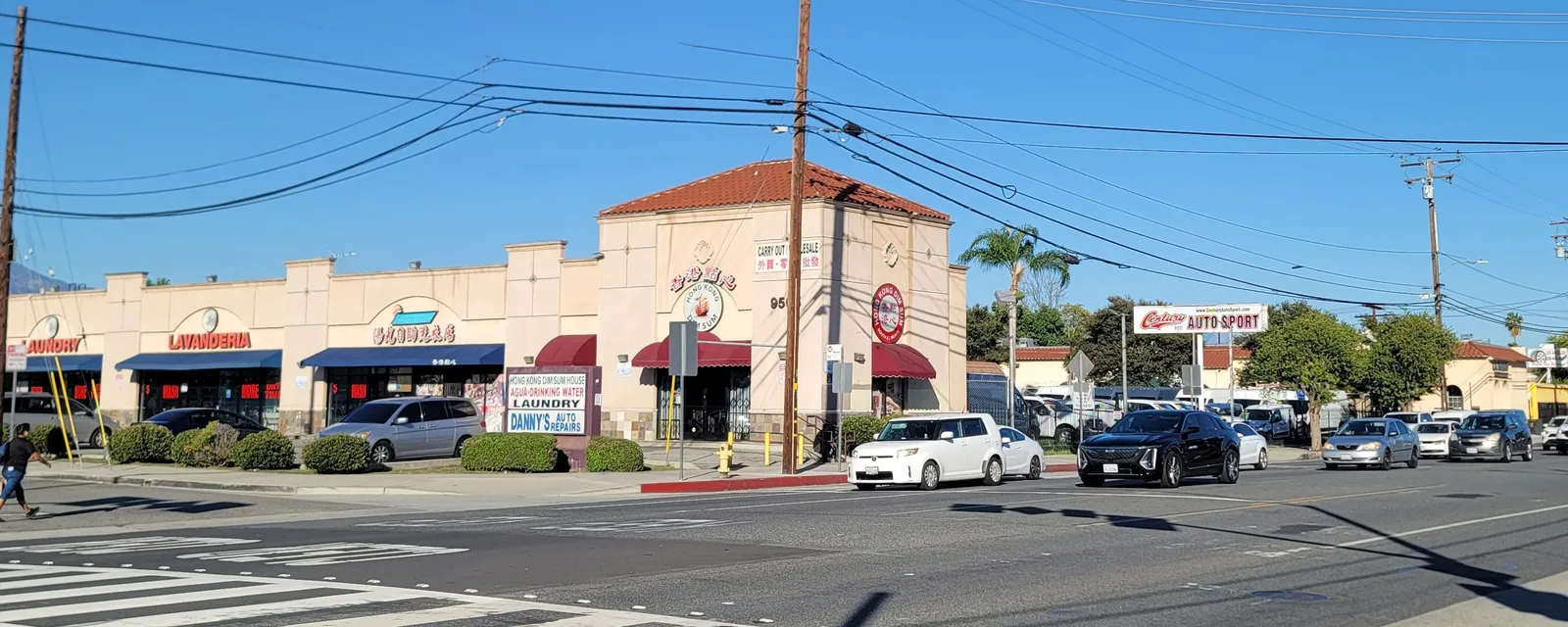 A corner shopping strip in Rosemead with a laundromat and small shops