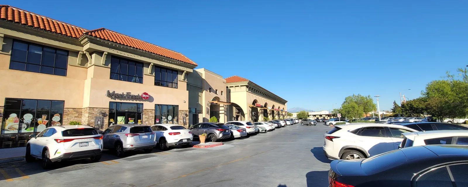 A shopping plaza with red tile roofs in Temple City